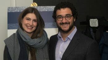 a man and a woman smiling